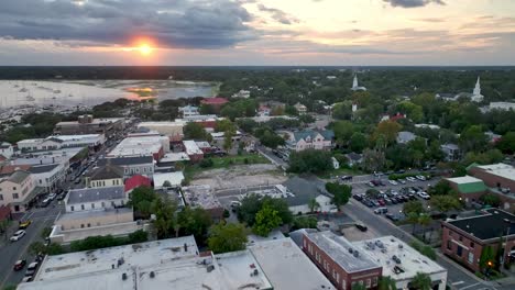 aerial view of charming coastal town at sunset