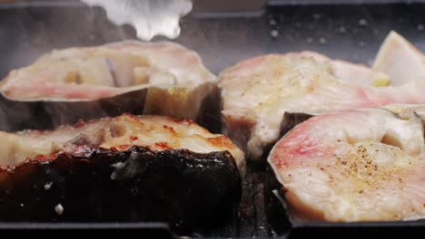 cooking fish on a grill pan
