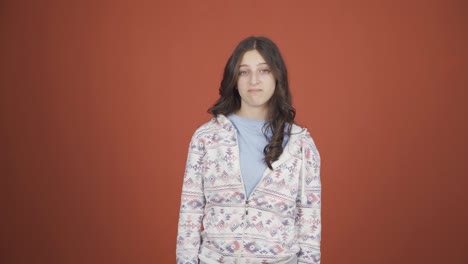 Young-woman-looking-at-camera-with-a-negative-expression.