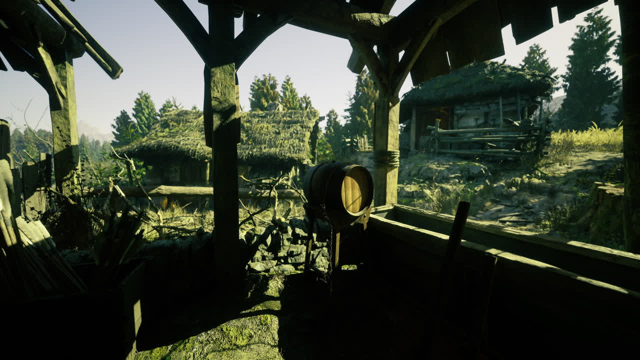 Rustic village view with barrel and thatched roofs under bright sunlight