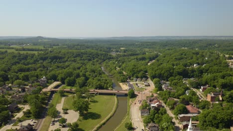 high aerial view above small town usa in summer