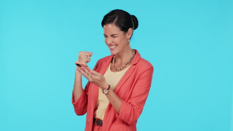 Woman,-fist-celebration-and-phone-in-studio