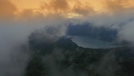 clouds over the lake surrounded with thick woodland in sierra de ocoa mountains in san jose de ocoa, dominican republic