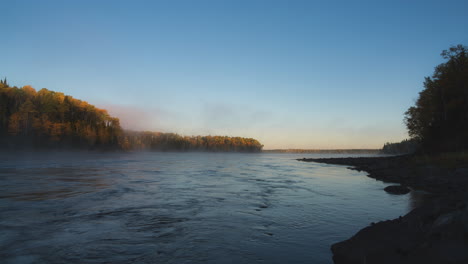 sunrise timelapse from a chilly night by a river