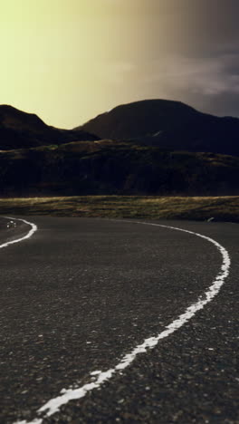 mountain winding road at sunrise/sunset