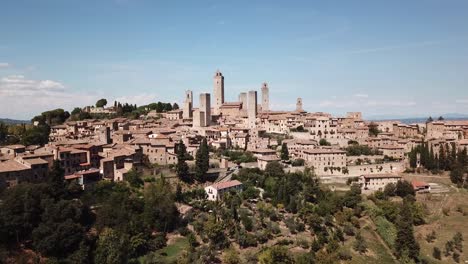 stunning drone view of the san gimignano towers in tuscany, italy