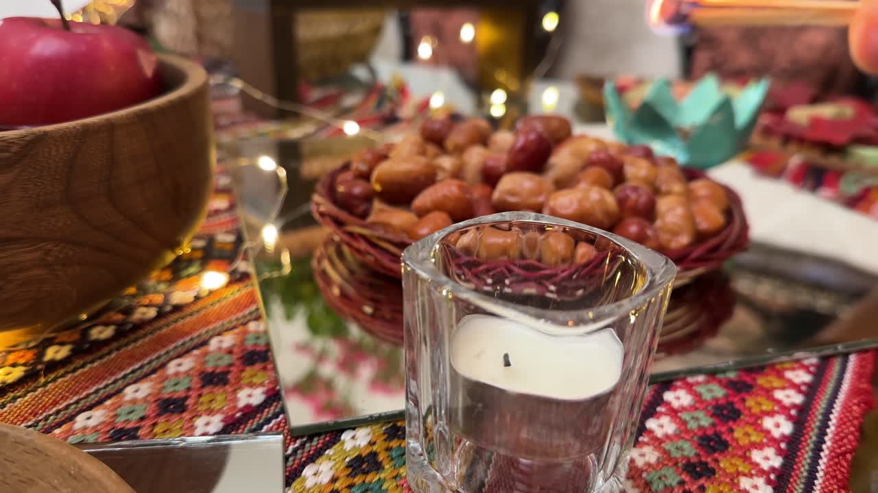 Russian olive fruit in colorful Nowruz haftsin table put candle lantern and apple sumac orange decoration traditional architecture interior scenic landscape nature lodge Tehran morning travel balcony