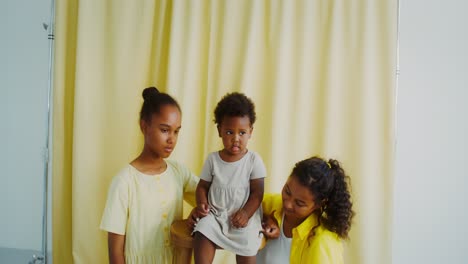 family portrait of mother and daughters
