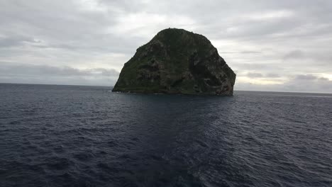 Aerial-drone-shot-over-le-rocher-du-diamant-and-ocean-in-martinique