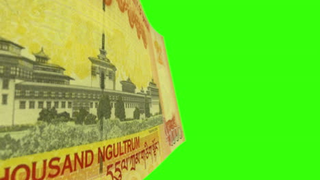 bhutanese 1000 ngultrum banknote on greenscreen background (front and back)