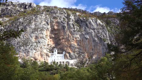 establishing shot of the ostrog monastery in montenegro