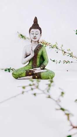 green buddha statue