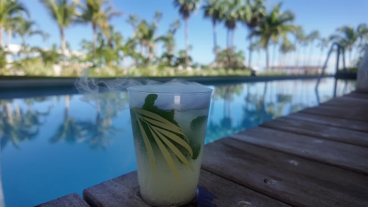 Refreshing Mojito by the Pool in a Tropical Paradise