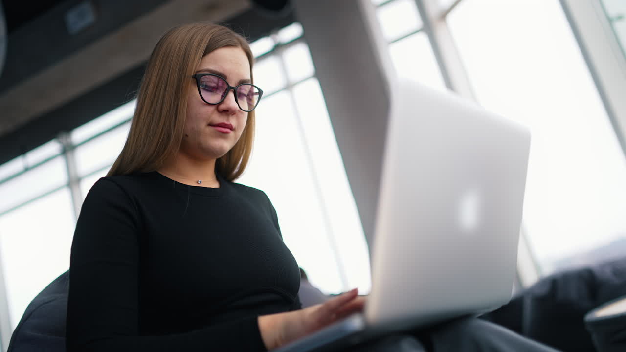 cheerful businesswoman at home office working on computer