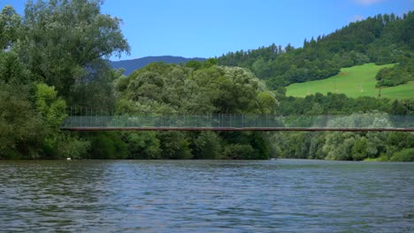 beautiful bridge crossing a small river in countryside of slovakia