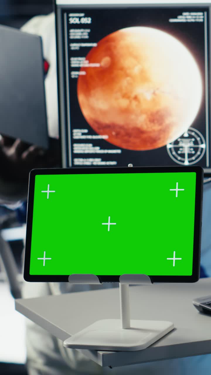 Vertical video Astronaut waves hand, communicating with command center to share discoveries