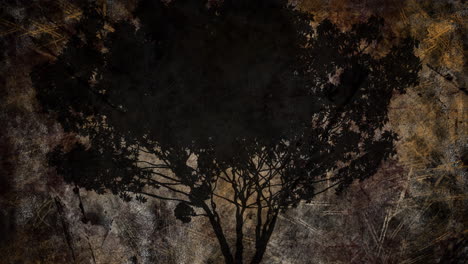 silueta de un árbol contra un fondo de textura parpadeante