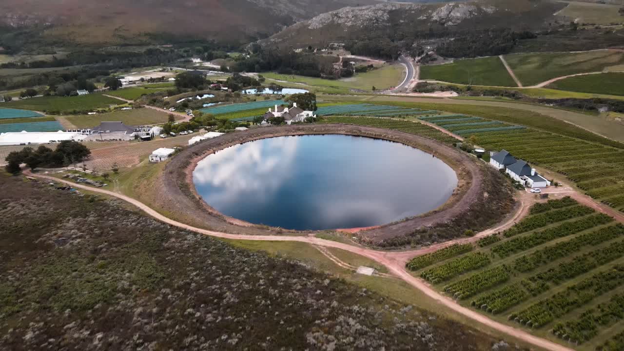Perfectly round, man made dam on a wine farm in South Africa