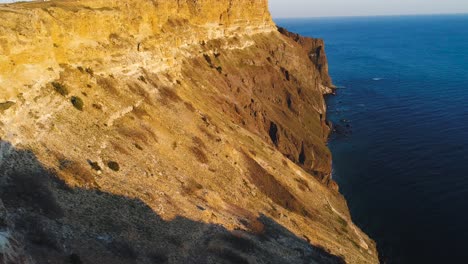 coastal cliff landscape at sunset