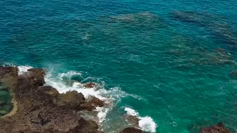 Drone-aerial-water-beach-cliffside-reefs-Hawaii