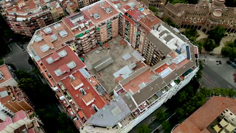 Aerial-drone-shot-of-a-high-rise-apartment-block-in-Barcelona-city