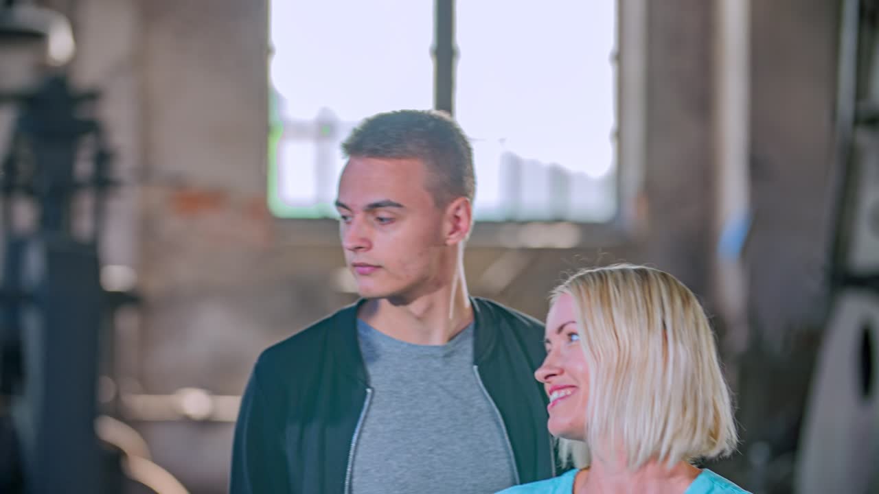 group of four people walking, smiling and talking. Dolly shot, slow motion