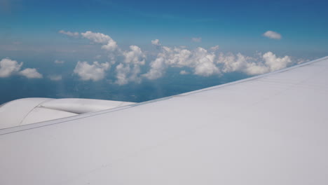 view from the plane window on the wing and the powerful jet engine