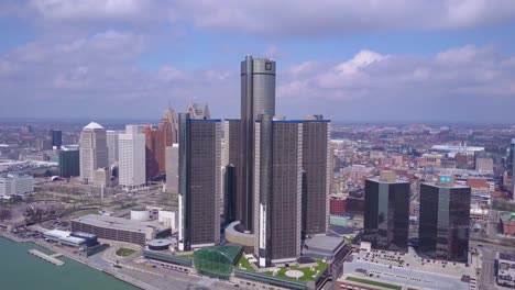 aerial shot of downtown detroit with gm tower and detroit river 2