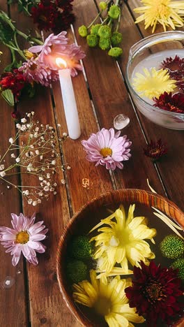 floral arrangement with candles and crystals