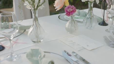 cropped view of a woman arranging tables for a wedding celebration. close-up shot