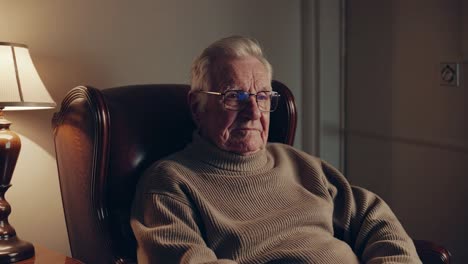 older man in armchair