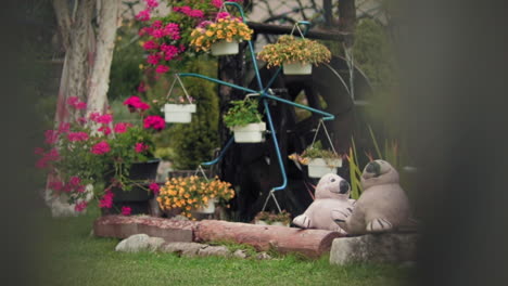 garden ornaments and decoration with a water wheel