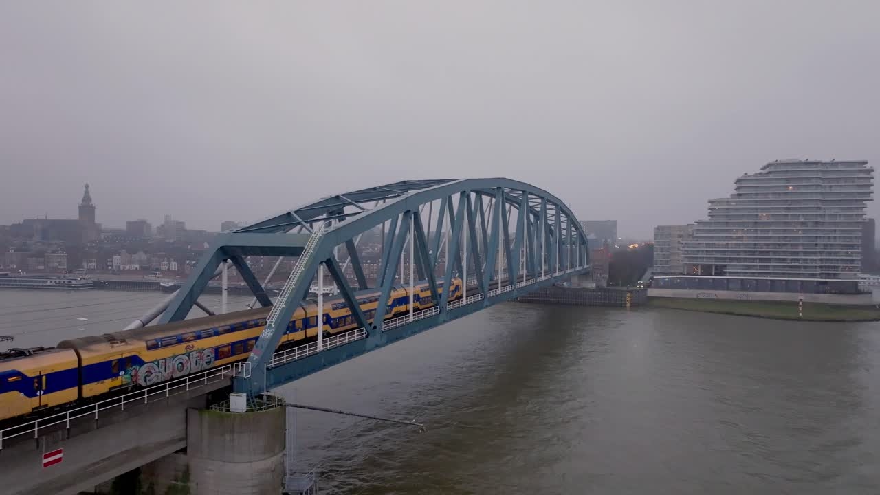 Drone Follow Shot of Train Heading Toward Nijmegen City