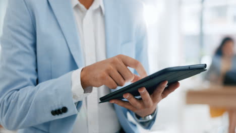 Typing,-tablet-and-hands-of-businessperson