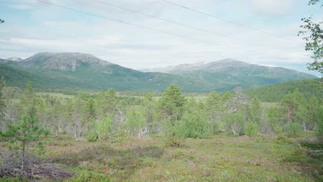 slider view of the anderdalen national park and segla mountains in senja island, norway