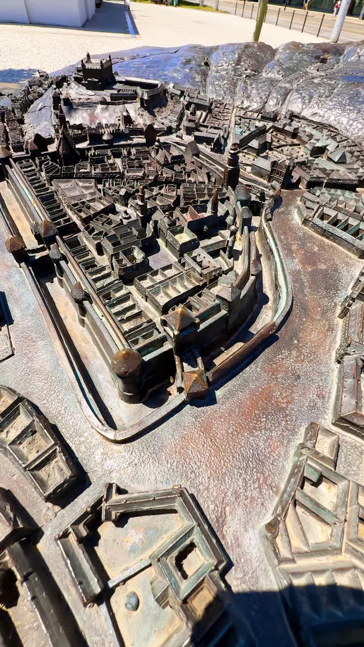Historical panorama of the city with Braille font. Metal model of old Bratislava, Slovakia. Vertical video.
