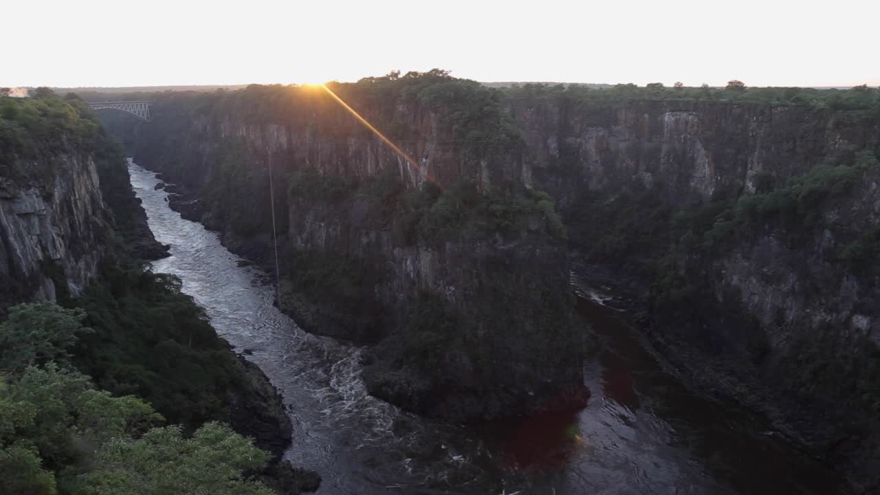 view of the zambezi river flowing in a gorge at sunrise, lookout panorama