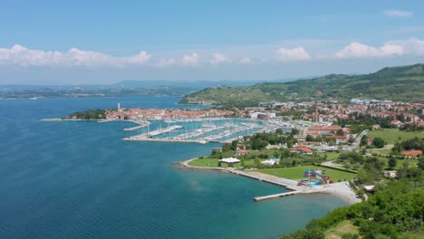 aerial view of simon's bay beach and archaeological park near the marina of izola, slovenia