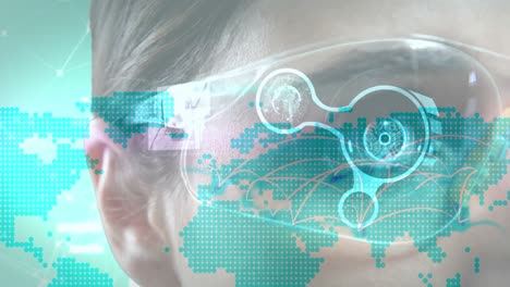 Animation-of-world-map-over-eye-of-woman-in-vr-glasses-using-interface