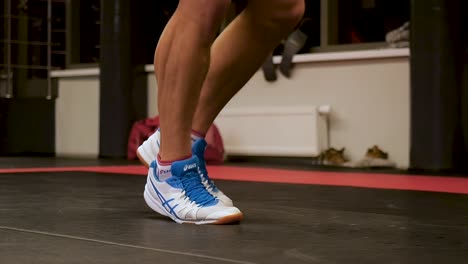 man jumping rope in gym