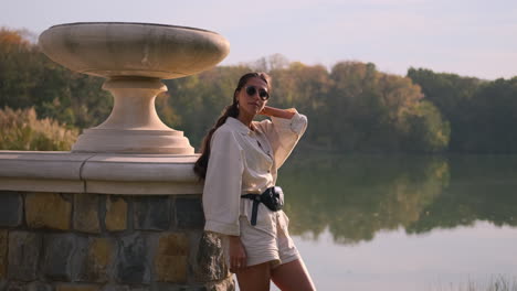 woman in park by the lake