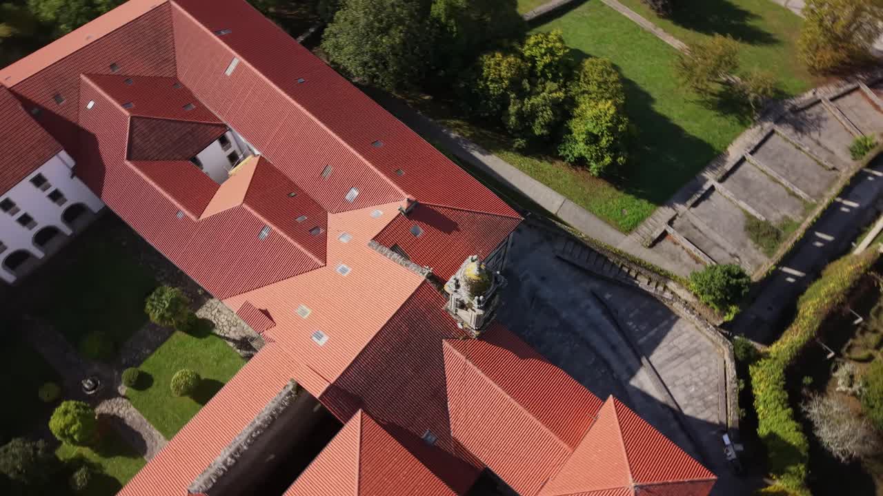 4K drone aerial view of the Belvís area in Santiago de Compostela, where you can see the church of Nuestra Señora del Portal and the convent