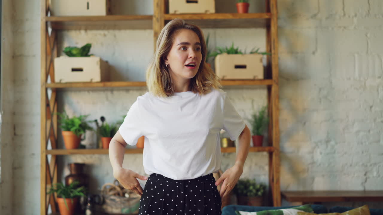 Woman in Casual Outfit Posing in a Home Interior
