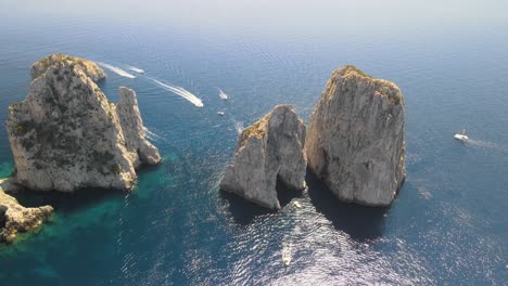 amazing aerial view of faraglioni in summer season, capri - italy