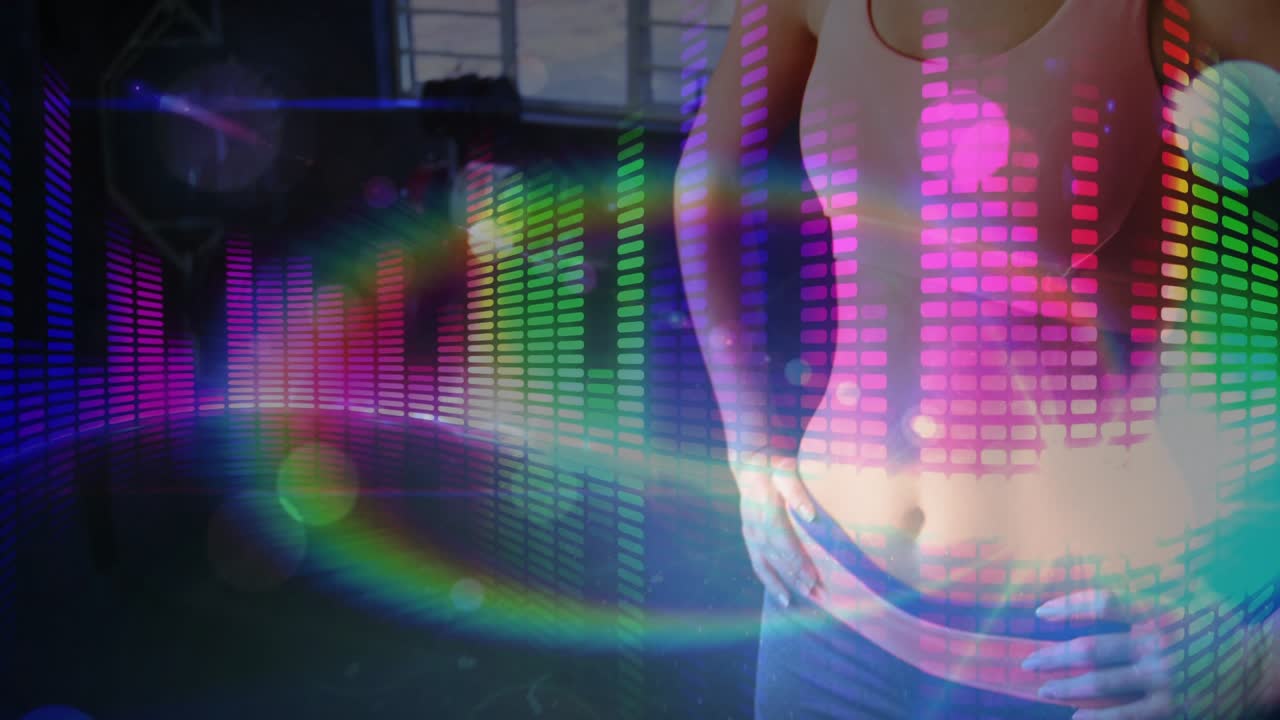 Female adjusting waistband, centering for fitness pose, animated EQ flares sweeping over torso