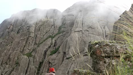 a woman hiking in the mountains