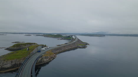 Scenic-coastal-drive-along-Atlantic-Ocean-Road-in-Norway,-aerial-dolly