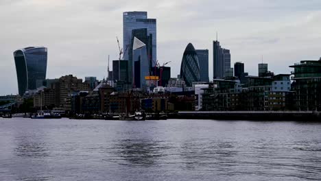 timelapse of the city of london over the river thames, england.