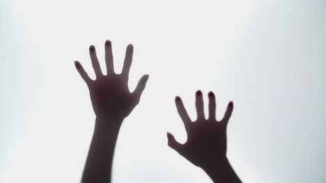 Abstract And Spooky Defocused Hand In Slow Motion