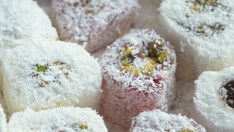 colorful turkish delight rolls covered in coconut